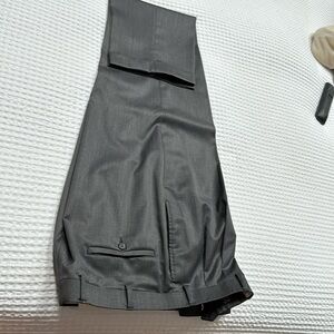 Men’s dark grey slacks cuffed